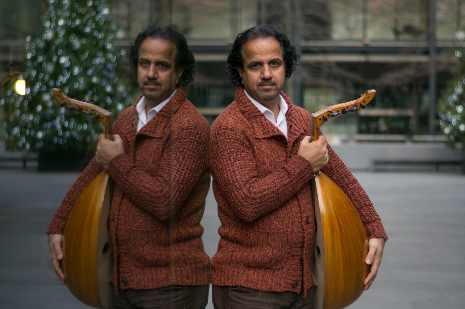 Ahmed Mukhtar with his oud at the school, London.